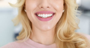 blonde lady showing beautiful white teeth cropped 2022 10 07 02 26 47 utc 1