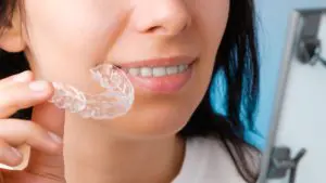 隱形矯正 3 close up woman holding a transparent removable bra 2021 09 30 20 50 06 utc 1