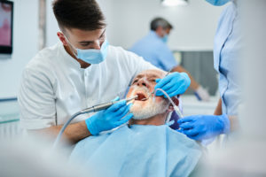 senior man having teeth polish procedure during ap 2022 11 09 03 48 34 utc 2