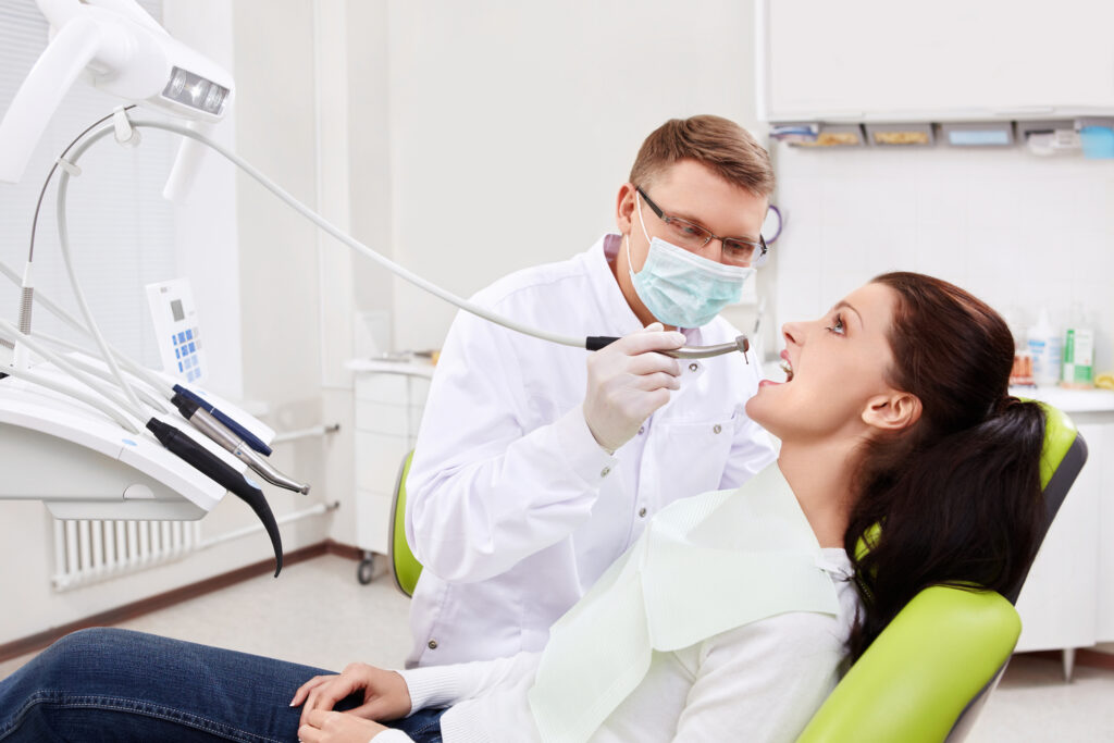 the dentist treats teeth of patient 2023 11 27 04 59 02 utc