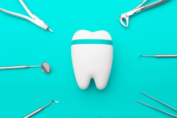 dentist-tools-around-the-tooth-2022-11-15-05-21-32-utc (2)