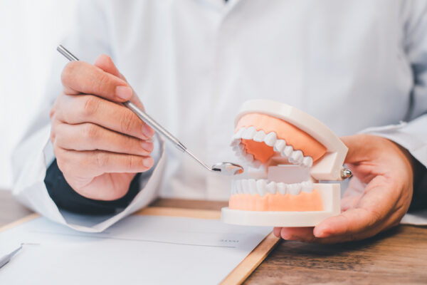dentists-are-demonstrating-with-dentures-to-educat-2022-11-19-03-12-47-utc (1)